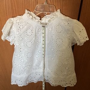 White eyelet blouse, high neck, cap sleeves, never worn, so pretty. size medium.